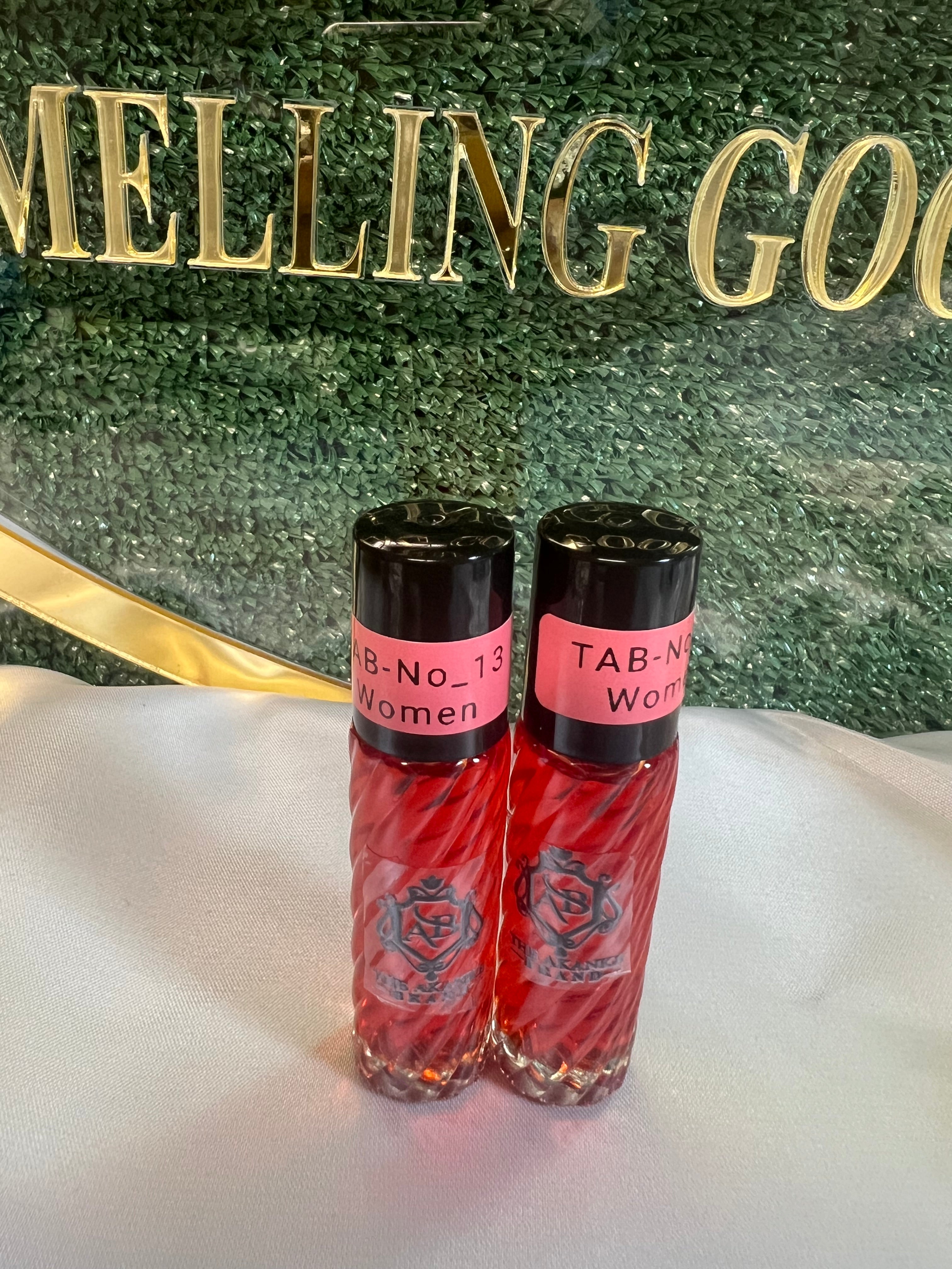 Perfume oil TAB 13(women)10ml 2pcs A wonderful exotic blend of raspberry, cantaloupe, and watermelon with a twist of jasmine and violet, and a hint of grapefruit and kumquat.