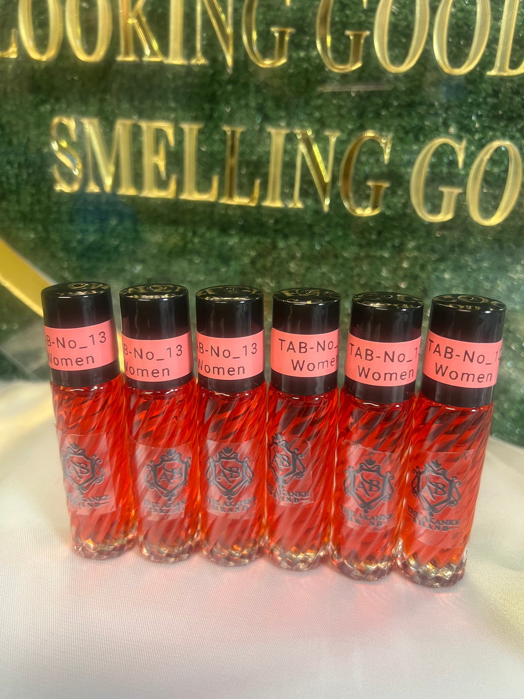 Perfume oil TAB 13(women)10ml 6pcs A wonderful exotic blend of raspberry, cantaloupe, and watermelon with a twist of jasmine and violet, and a hint of grapefruit and kumquat.