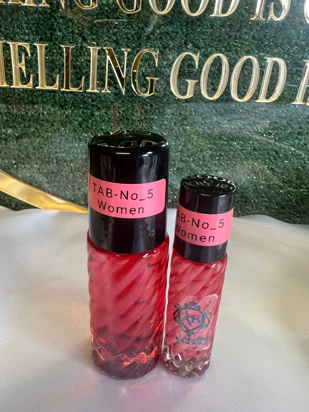 Perfume oil TAB NO5(women)25ml+10ml Fruitand Quince; middle notes are Peony and Freesia; base notes are Sugar, Almond Cream, Amber, Sandalwood and Musk